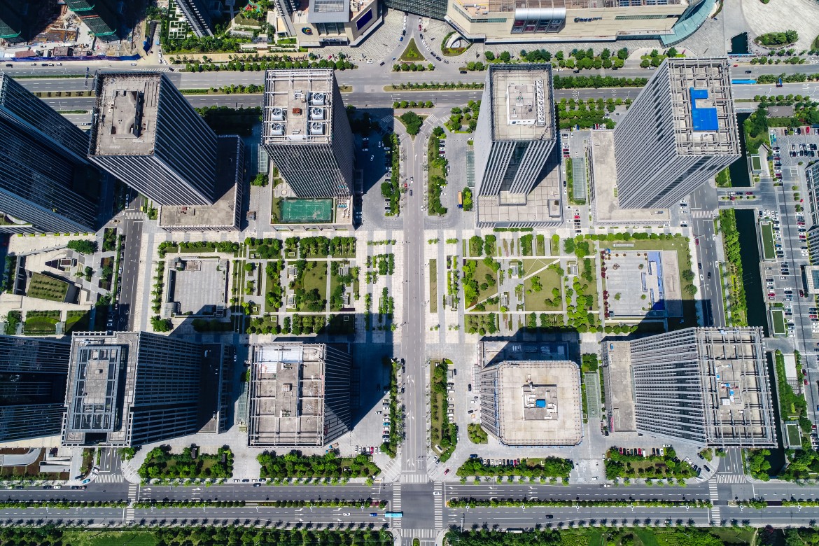 Aerial view of modern high-rise office buildings and city infrastructure