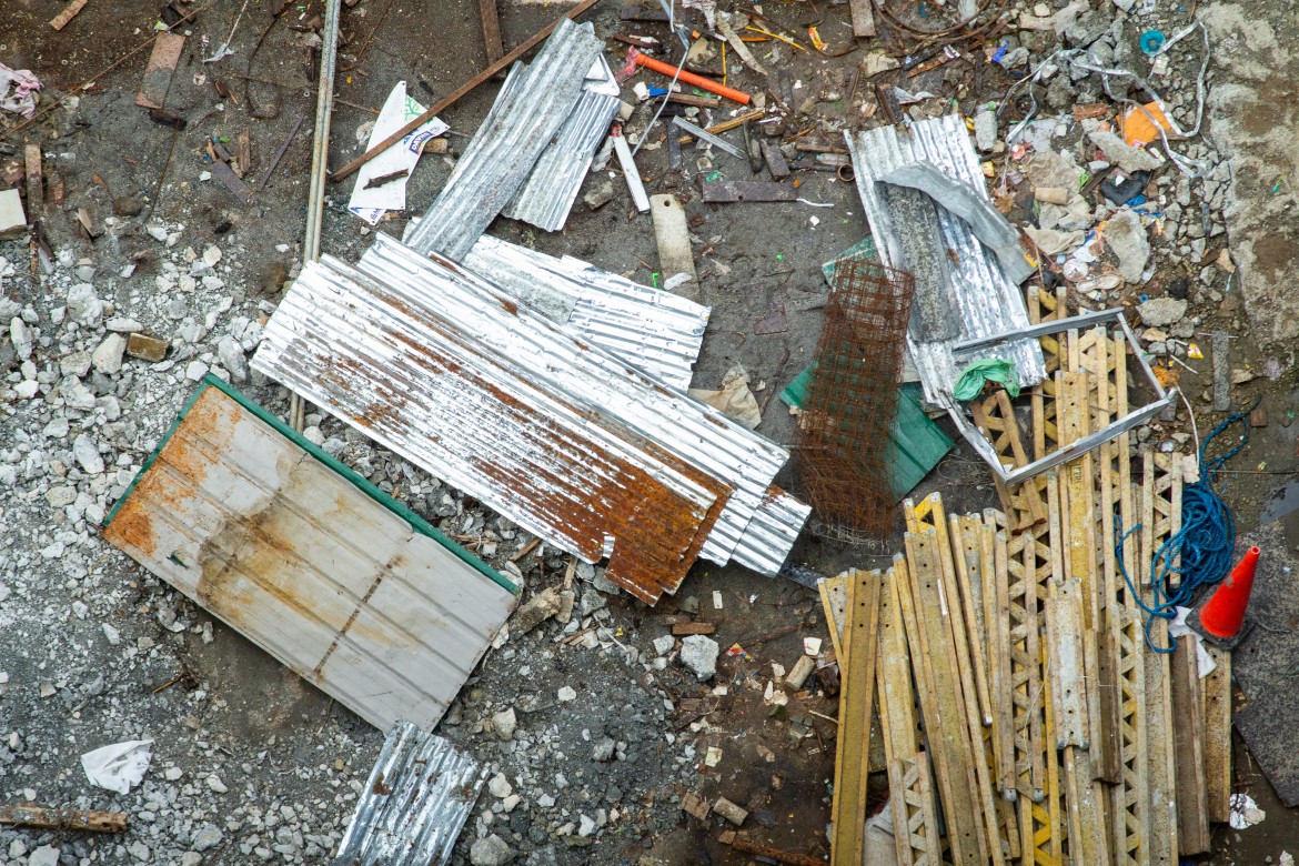 Mixed construction waste materials on demolition site